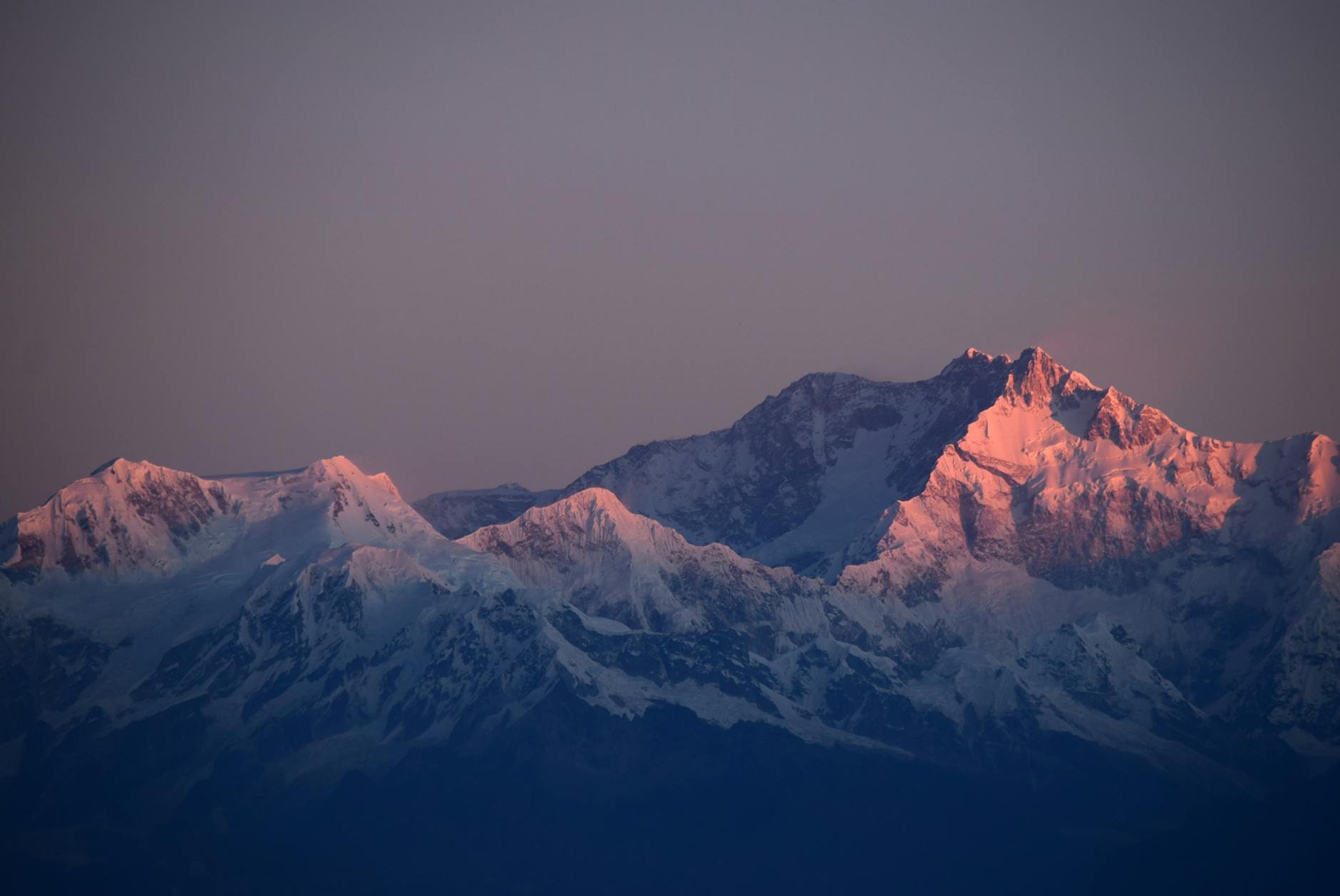 Breathtaking sunset view of snow-capped mountains in Nepal, perfect for scenic backgrounds. Breathtaking sunset view of snow-capped mountains in Nepal, perfect for scenic backgrounds.