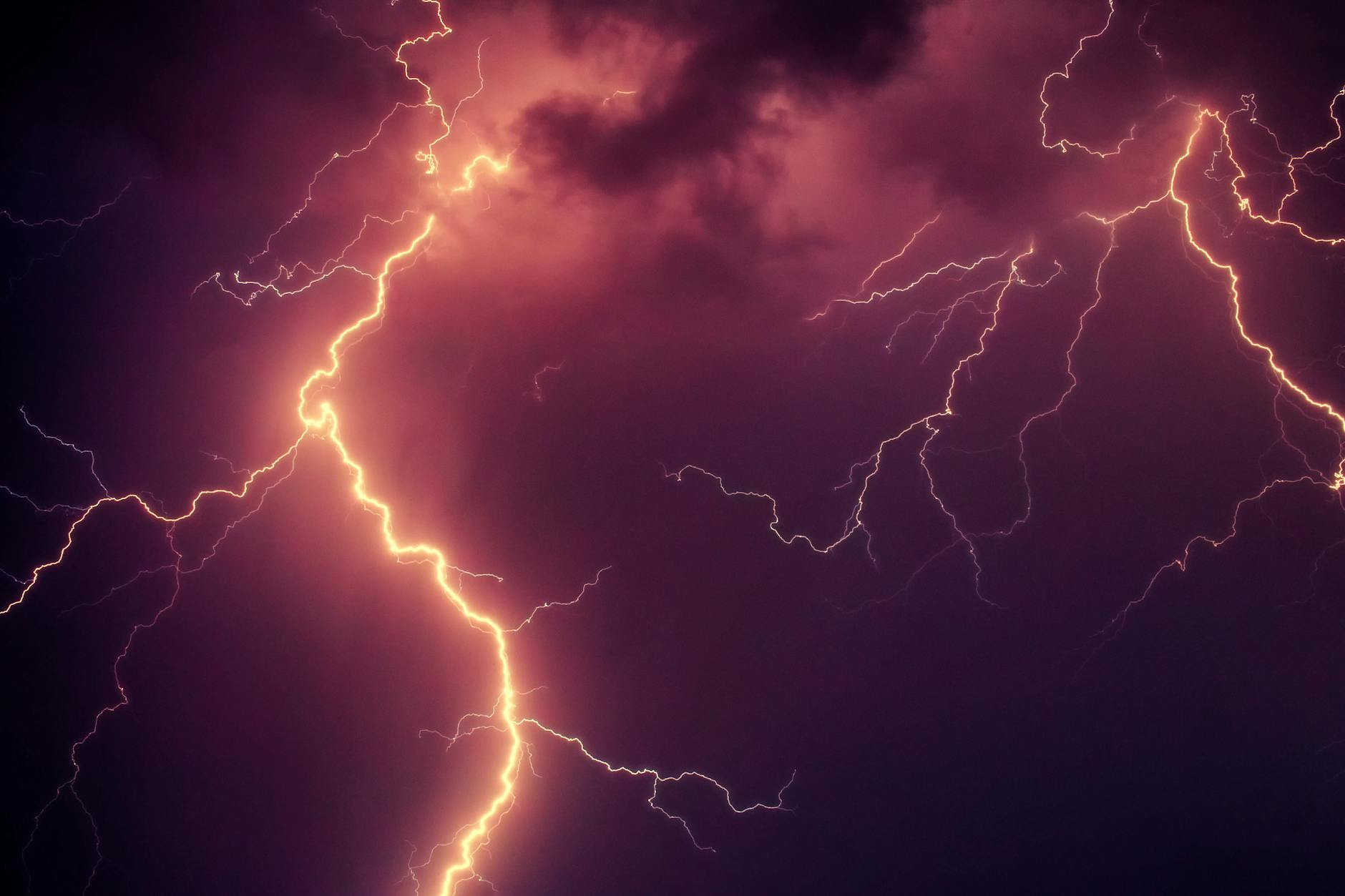 Stunning capture of bright lightning illuminating a dark stormy sky at night. Stunning capture of bright lightning illuminating a dark stormy sky at night.