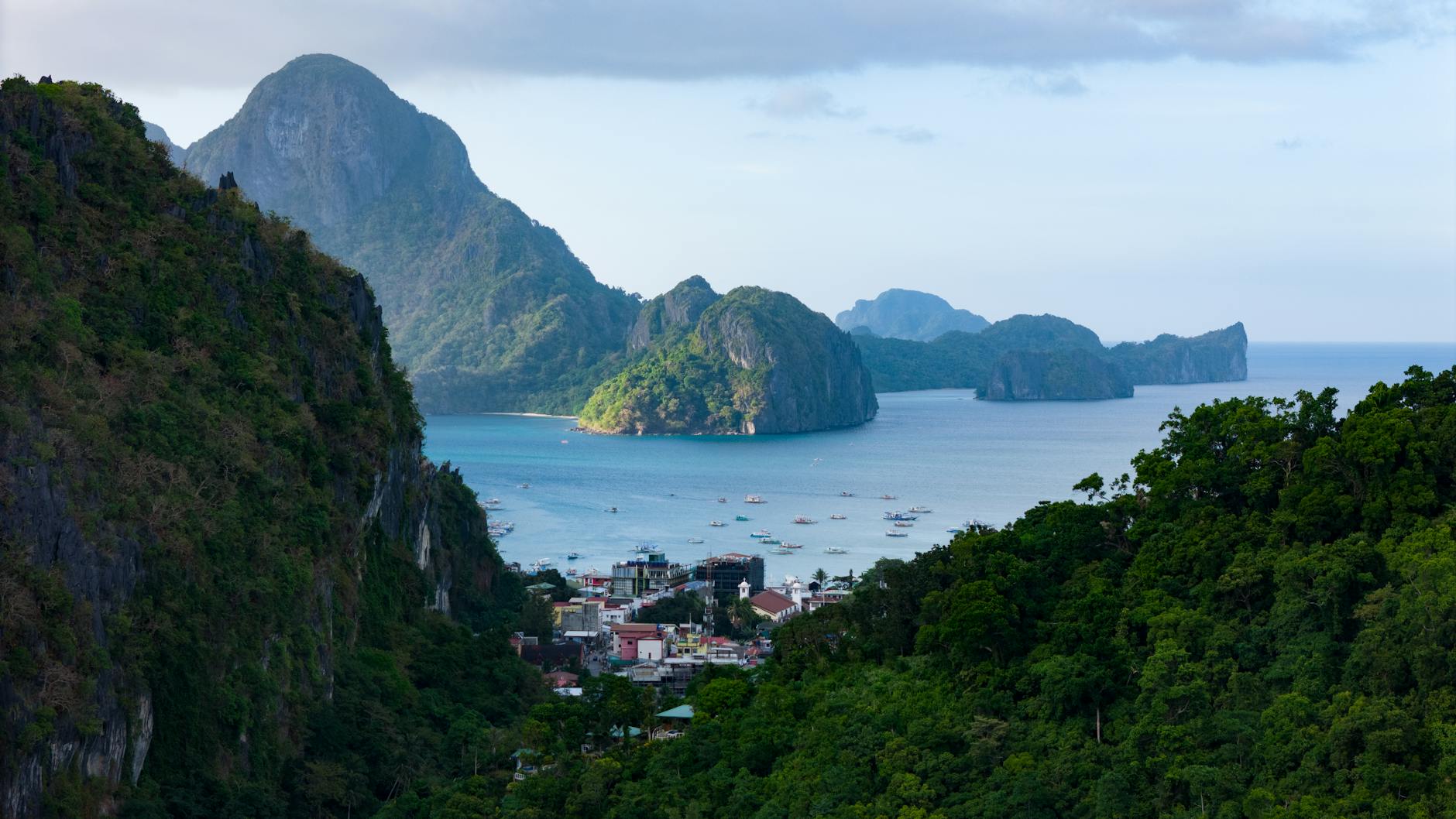 Drone view of karst peaks and sea in El Nido, Palawan, Philippines. Drone view of karst peaks and sea in El Nido, Palawan, Philippines.