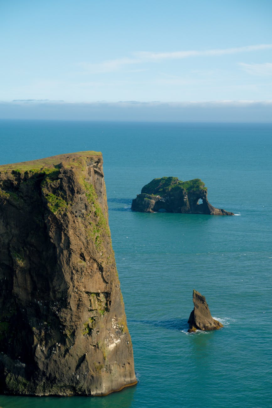 Stunning coastal cliffs with sea view, capturing Iceland’s natural beauty. Perfect for travel inspiration. Stunning coastal cliffs with sea view, capturing Iceland’s natural beauty. Perfect for travel inspiration.