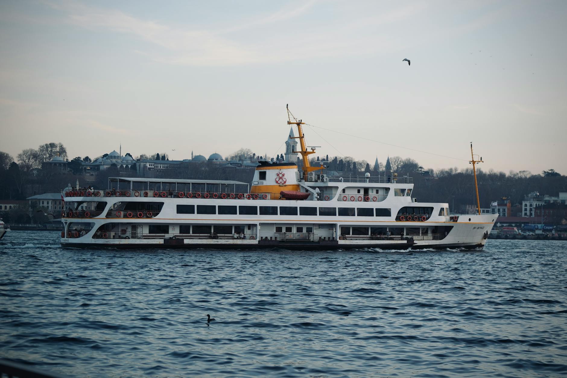 Ferry cruising on the Bosphorus in İstanbul during a peaceful day. Ferry cruising on the Bosphorus in İstanbul during a peaceful day.