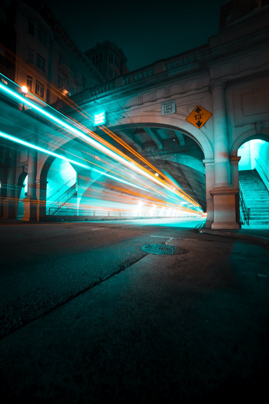 Long exposure capturing light trails in the Stockton Tunnel, San Francisco, creating a dynamic urban scene.