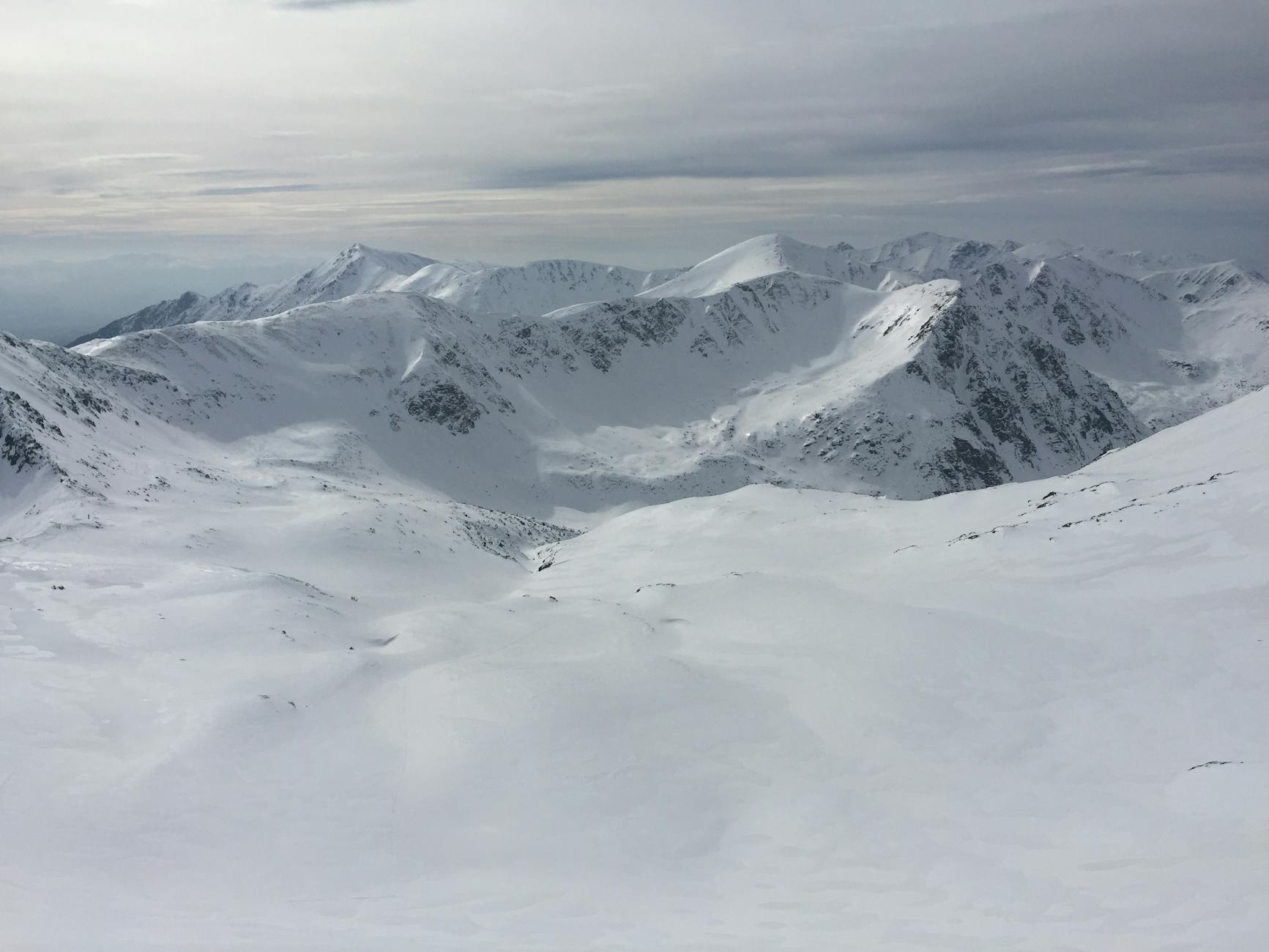 Captivating view of snowy peaks in the Tatra Mountains, Lesser Poland, during winter.