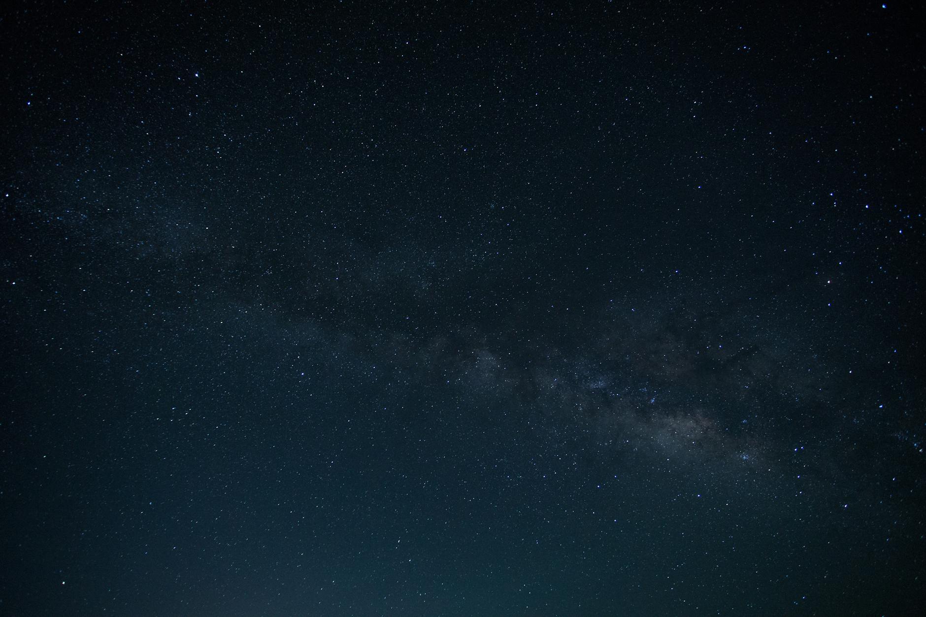 A breathtaking view of the Milky Way across a starry night sky, ideal for backgrounds. A breathtaking view of the Milky Way across a starry night sky, ideal for backgrounds.