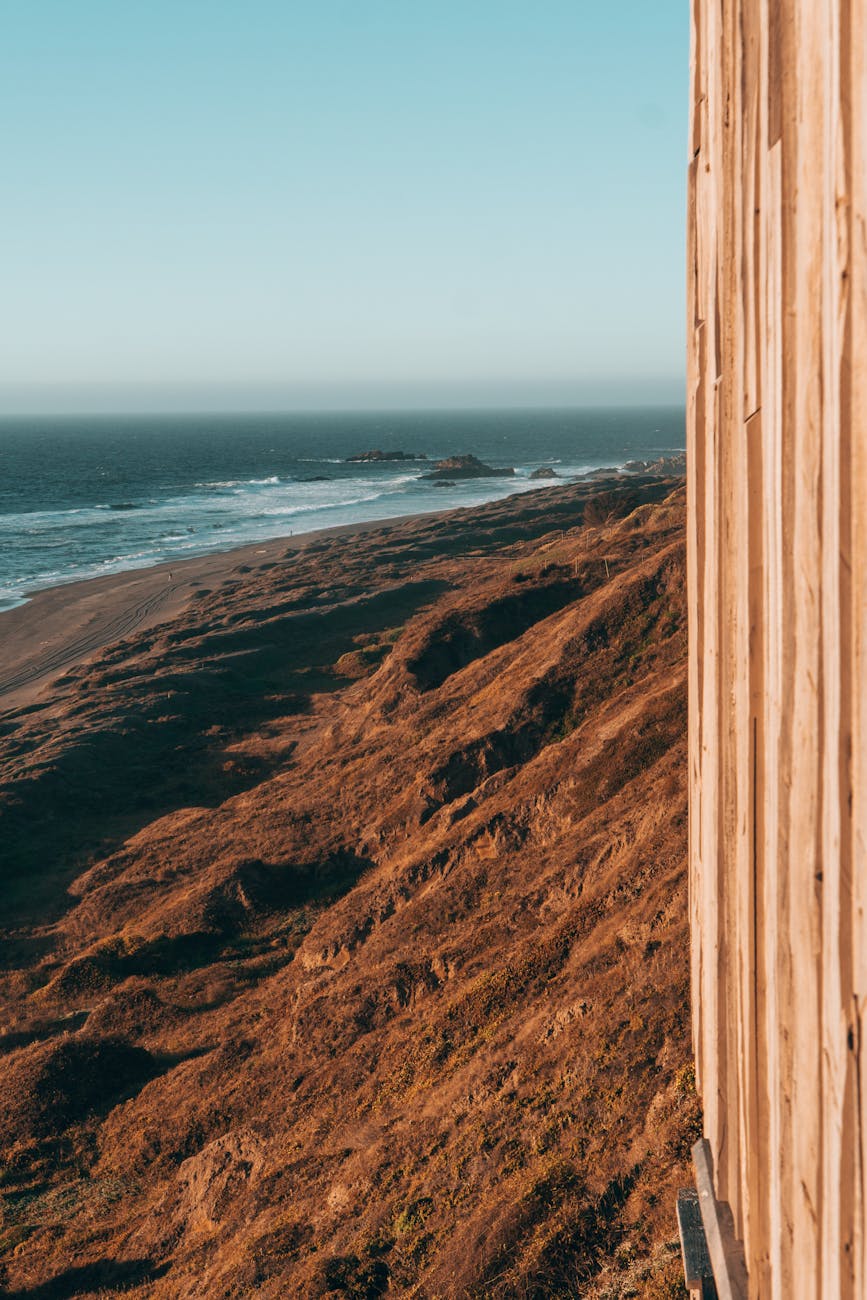 Breathtaking view of Matanzas coastline with rugged cliffs and ocean waves under a clear sky. Breathtaking view of Matanzas coastline with rugged cliffs and ocean waves under a clear sky.