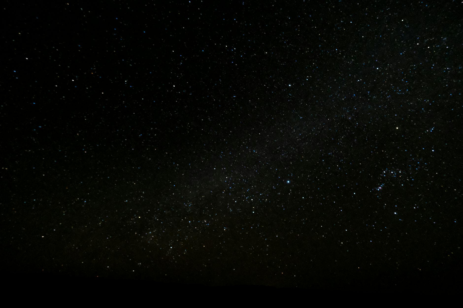 Capture of the starry night sky over Ksar Tanamouste, Morocco, showcasing a vibrant universe. Capture of the starry night sky over Ksar Tanamouste, Morocco, showcasing a vibrant universe.